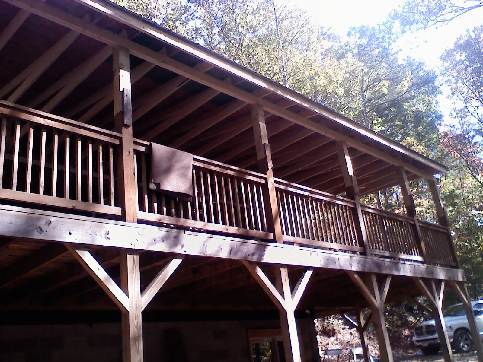 Timber framing under a new elevated porch and deck — Roof Leak Repair in Van Nuys by Roofing Brothers